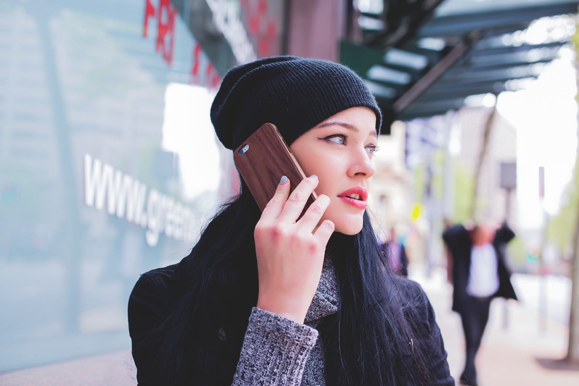 girl on phone near doctor | HealthCare.com